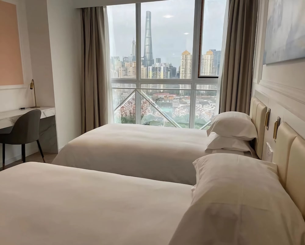 Фото Magnificent International Hotel Xintiandi People's Square