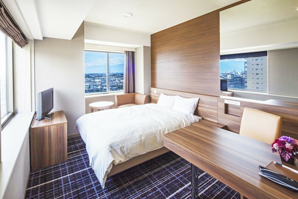 Фото Kofu Kinenbi Hotel