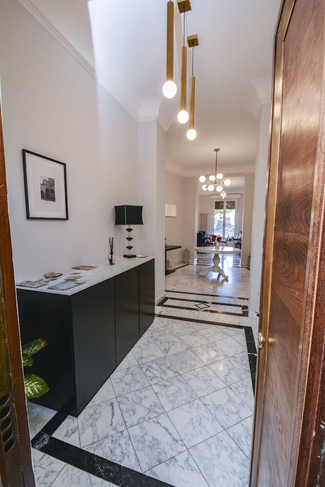 Фото Compasso Suites