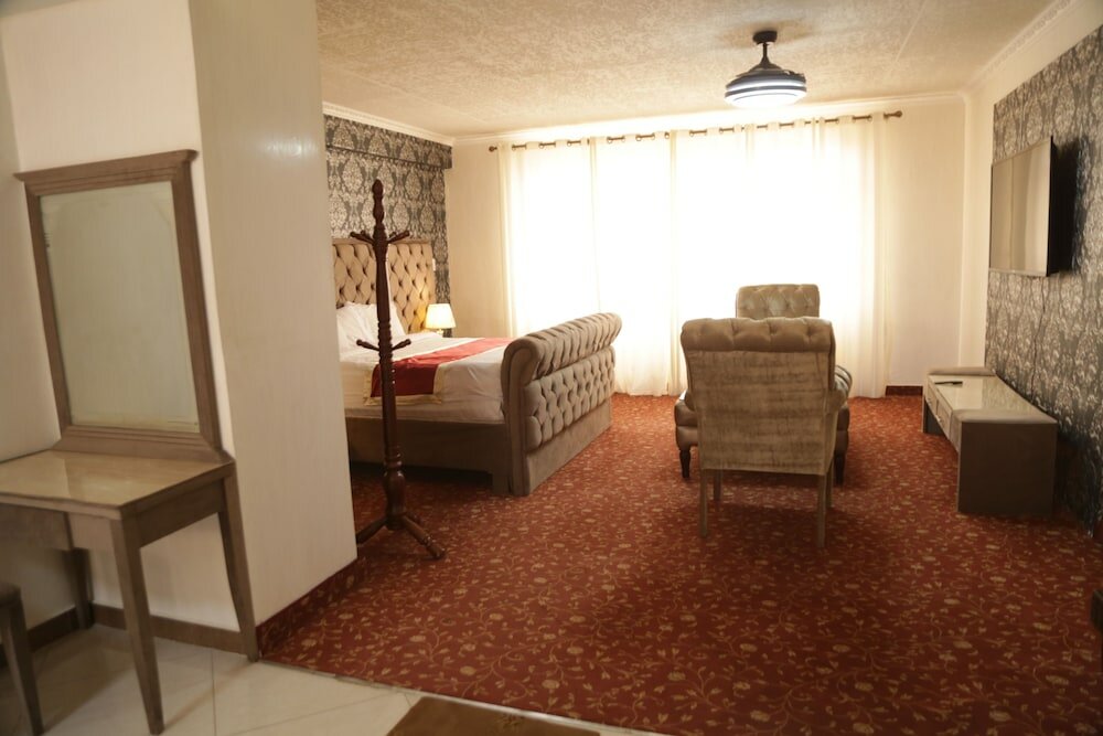 Фото Elite Suites Hotel