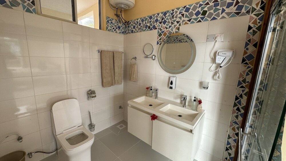 Фото Double A Nungwi Beach Hotel