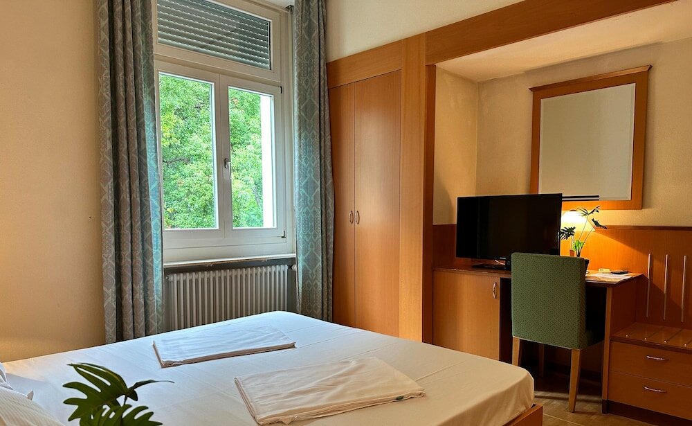 Фото E-Rooms Minusio