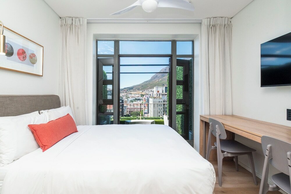 Фото Habitat Aparthotel by Totalstay
