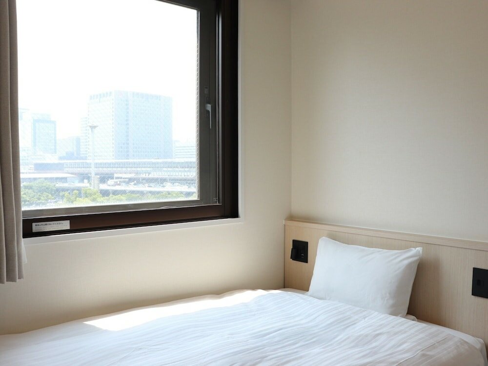 Фото Shin Osaka Station Hotel