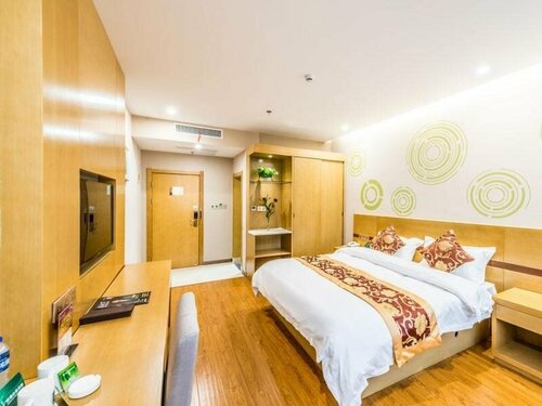 Гостиница GreenTree Inn Wuxi Binhu District Datong Road Zhouxin Hotel в Уси