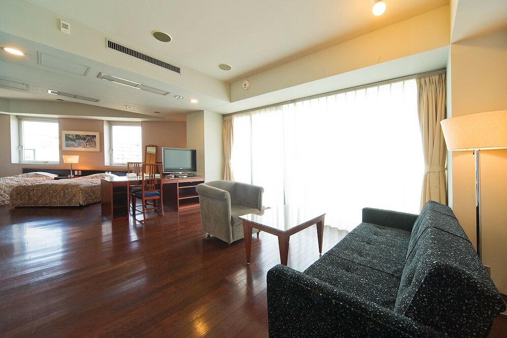 Фото The Residential Suites Fukuoka