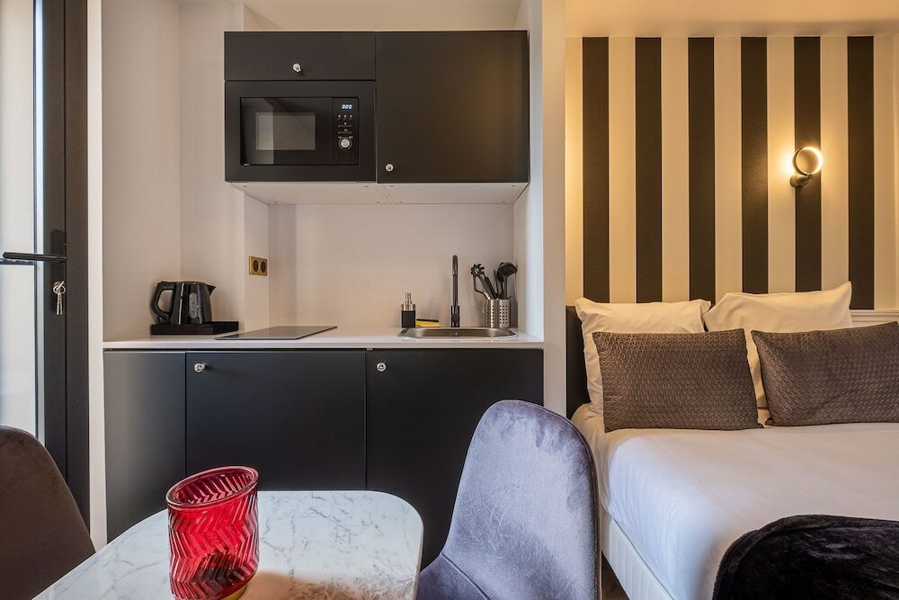 Фото Mijo's Appartements Hôtel