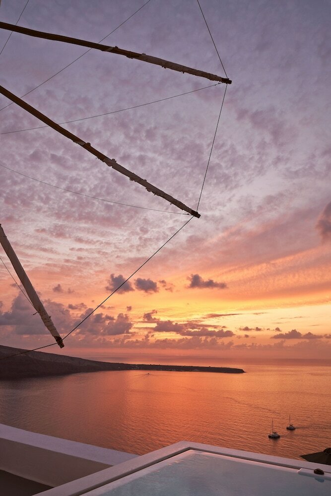 Фото Charisma Suites