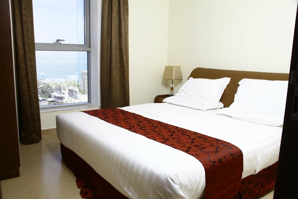 Фото Laguna Hotel Suites