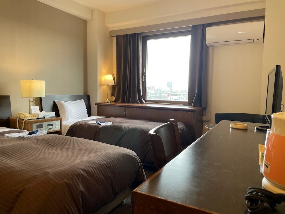 Фото Kanku Hotel Sunplus Yutaka