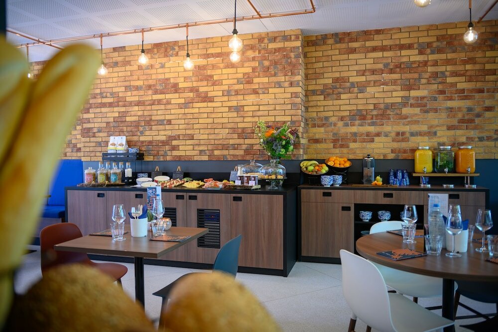 Фото Tulip Inn Antwerpen