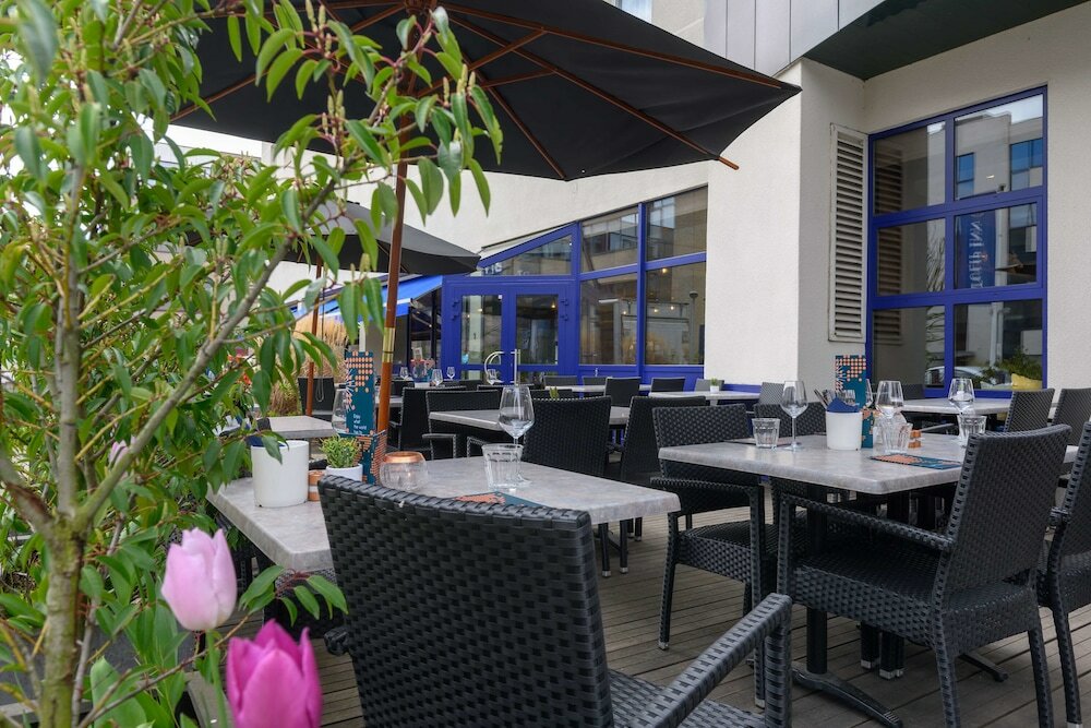 Фото Tulip Inn Antwerpen