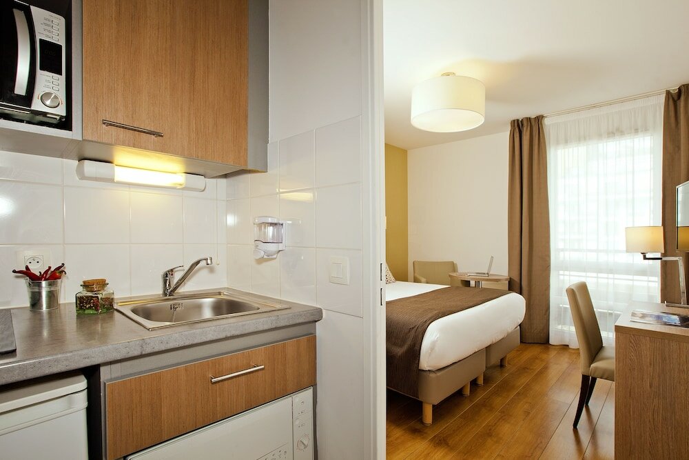 Фото Residhome Appart Hotel Monceau