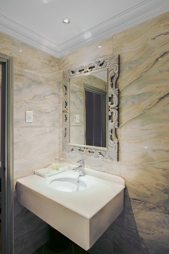 Фото A&em - The Petit Hotel