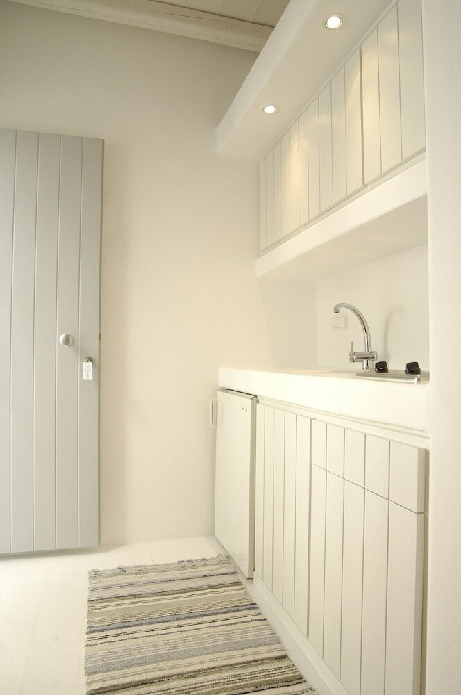 Фото Kapetan Tasos Suites