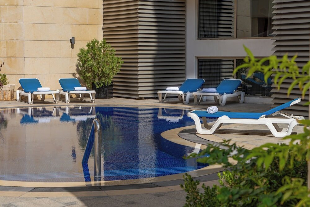 Фото Corp Amman Hotel