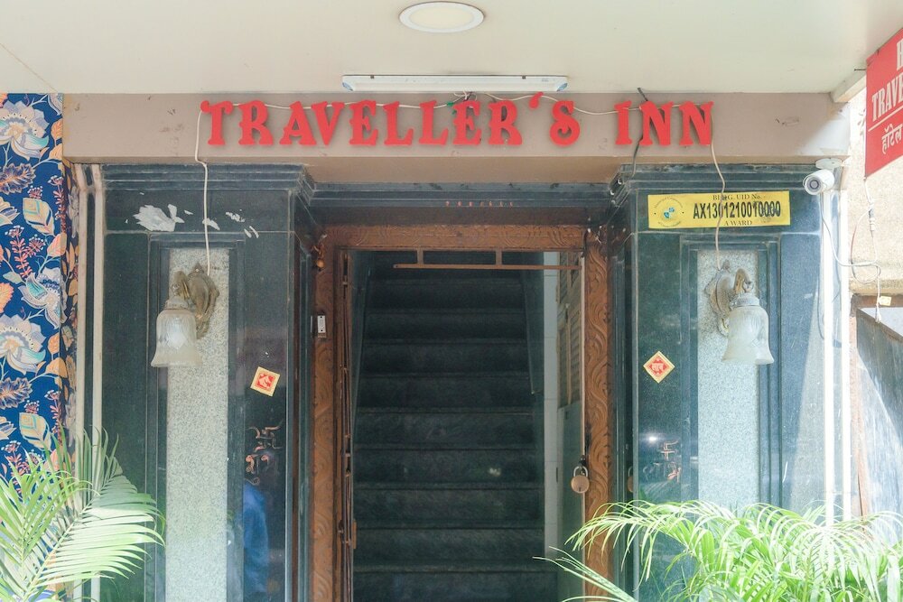 Фото Travellers Inn Mumbai