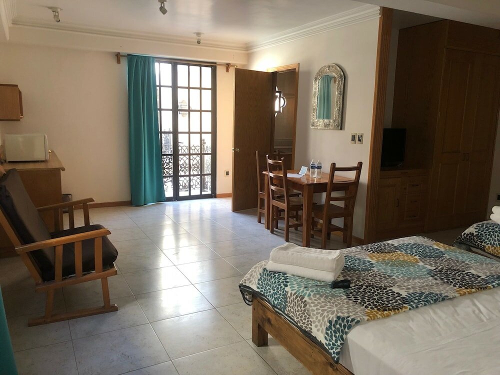 Фото Suites Sevilla