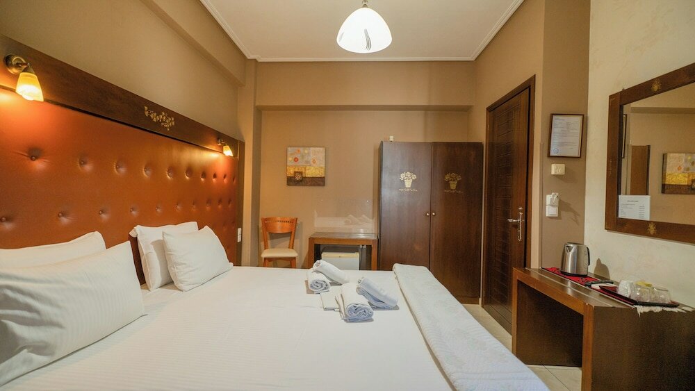 Фото Toti Boutique Rooms
