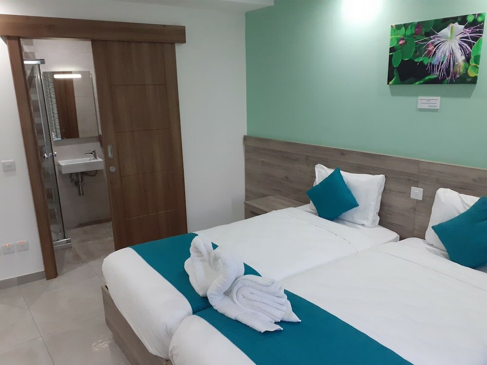 Фото TJ Boutique Accommodation