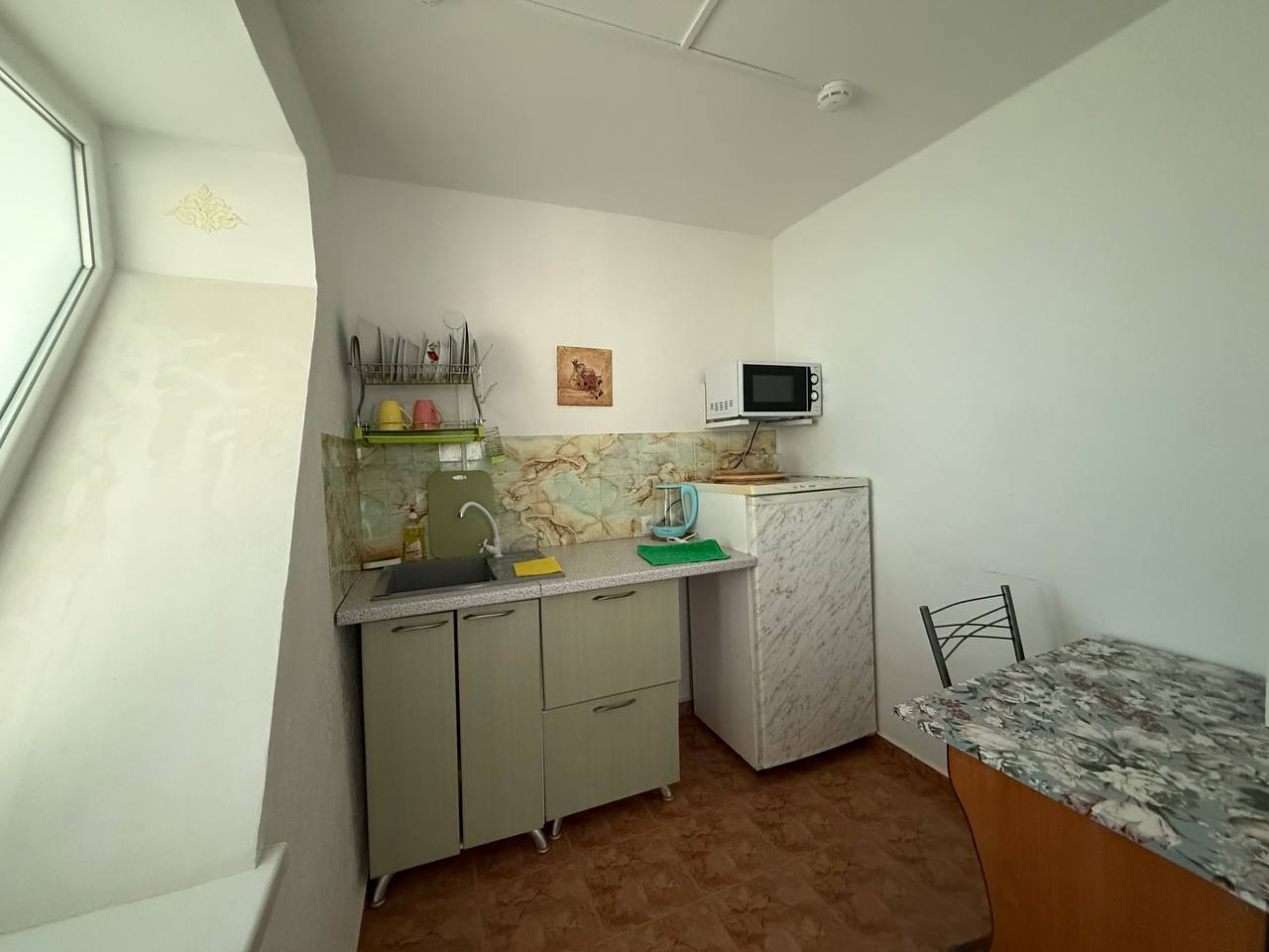 Фото Зеленый дом у маяка