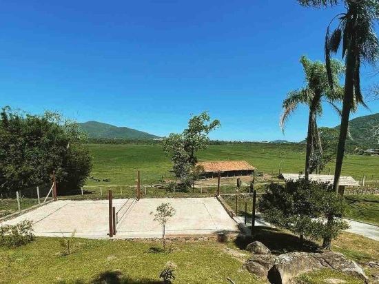 Фото Casa de Vidro - Hospedar com Propósito