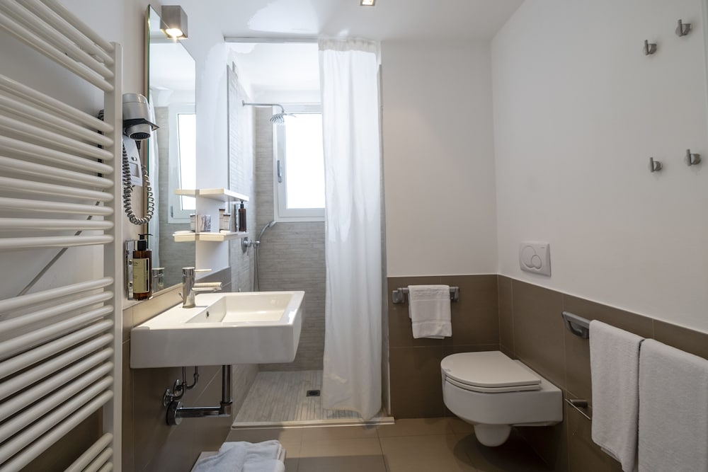 Фото Le Rose Suite Hotel