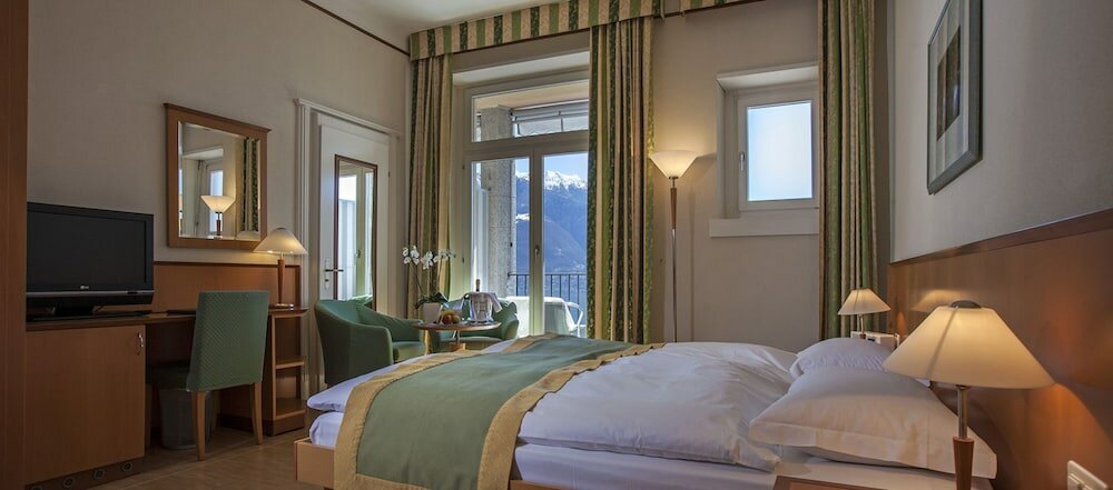 Фото E-Rooms Minusio