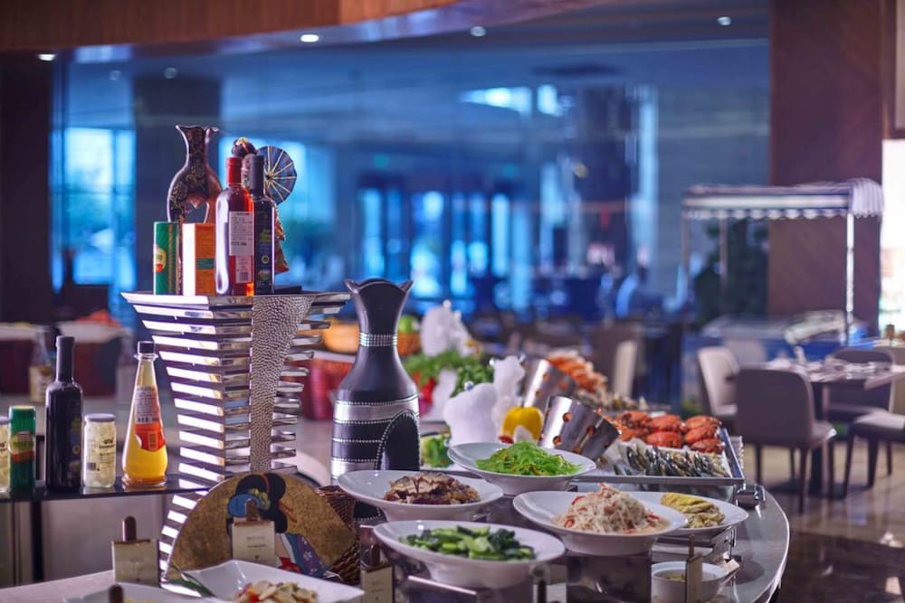 Фото Grand New Century Hotel Fuyang