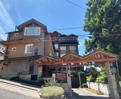 Фото Ruca Cheli Village Ski Hotel