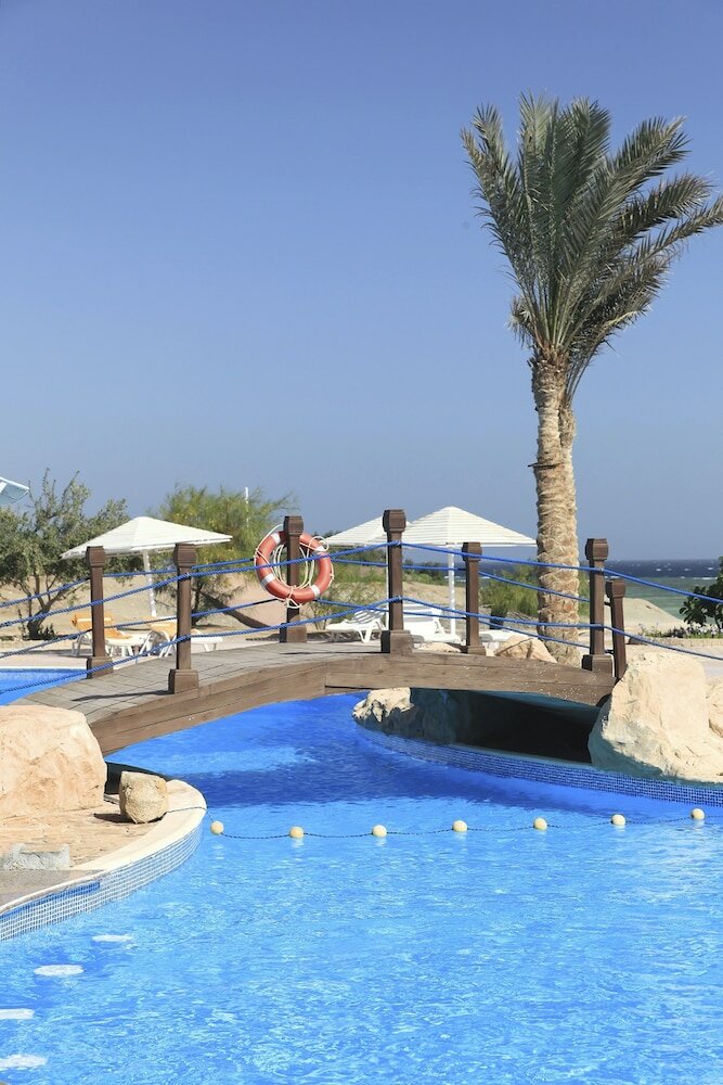 Фото The Three Corners Equinox Beach Resort