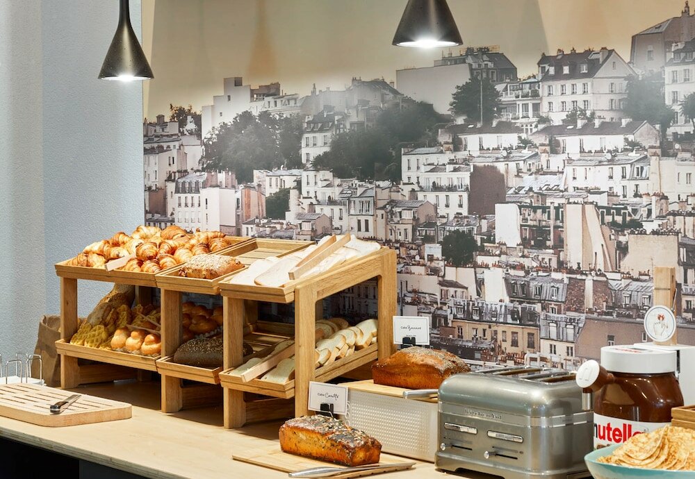 Фото Novotel Suites Paris Nord 18ème Hotel