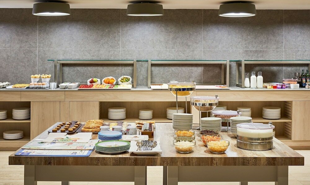 Фото Отель Nh Las Palmas Playa las Canteras