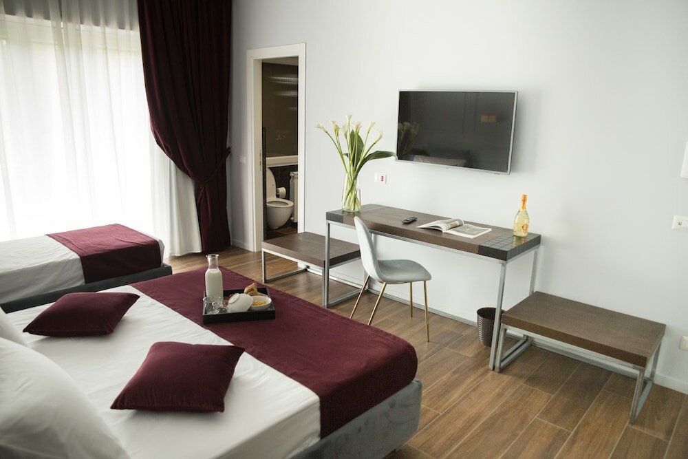 Фото Unicum Roma Suites