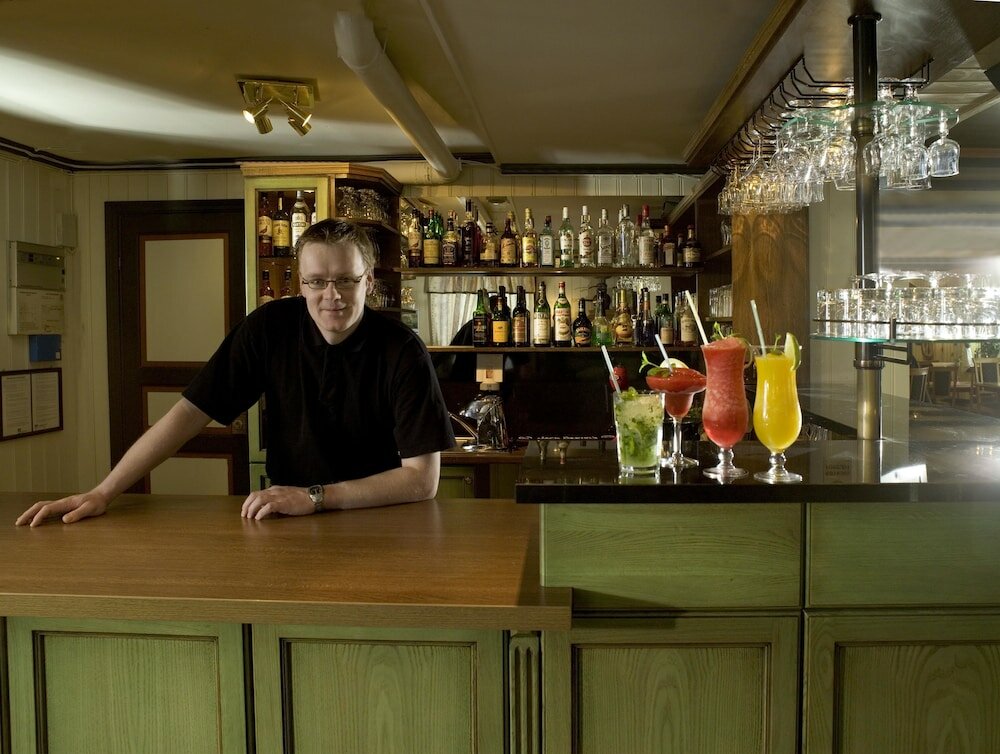 Фото Kjøbmandsgaarden Hotel