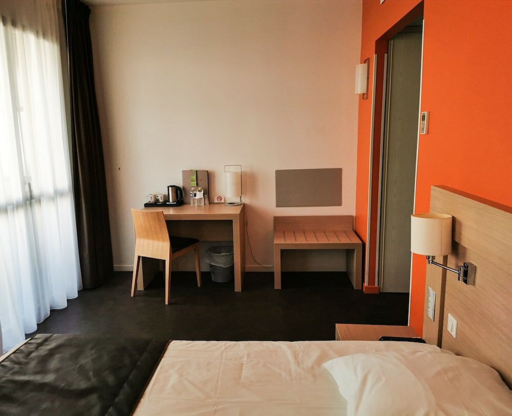 Фото Esatitude Hôtel