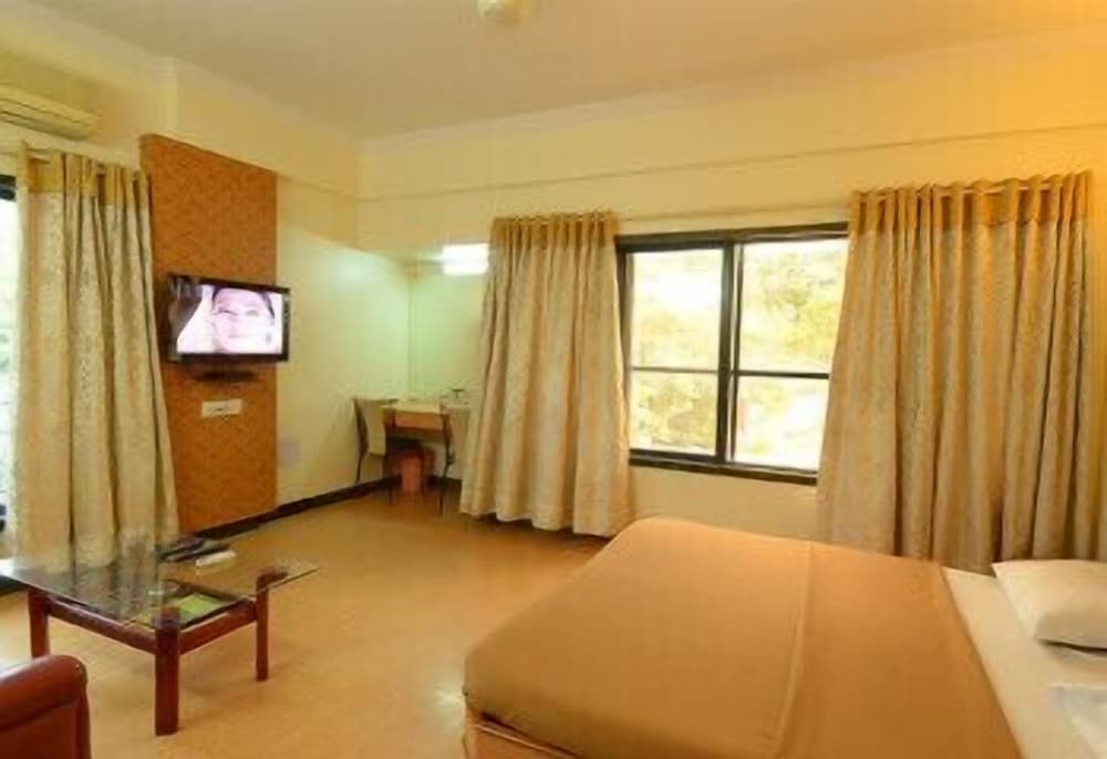 Фото Отель Pooja International