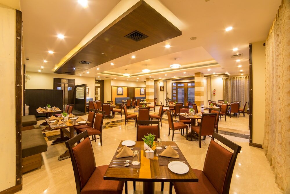 Фото Amantra Comfort Hotel