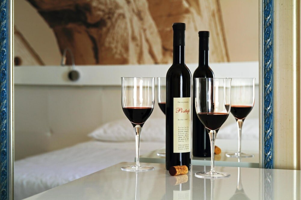 Фото La Porta Luxury Rooms