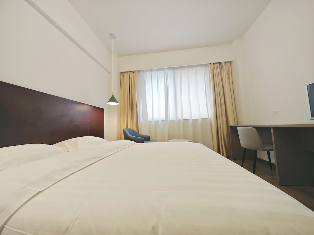 Фото Xinghua Hotel
