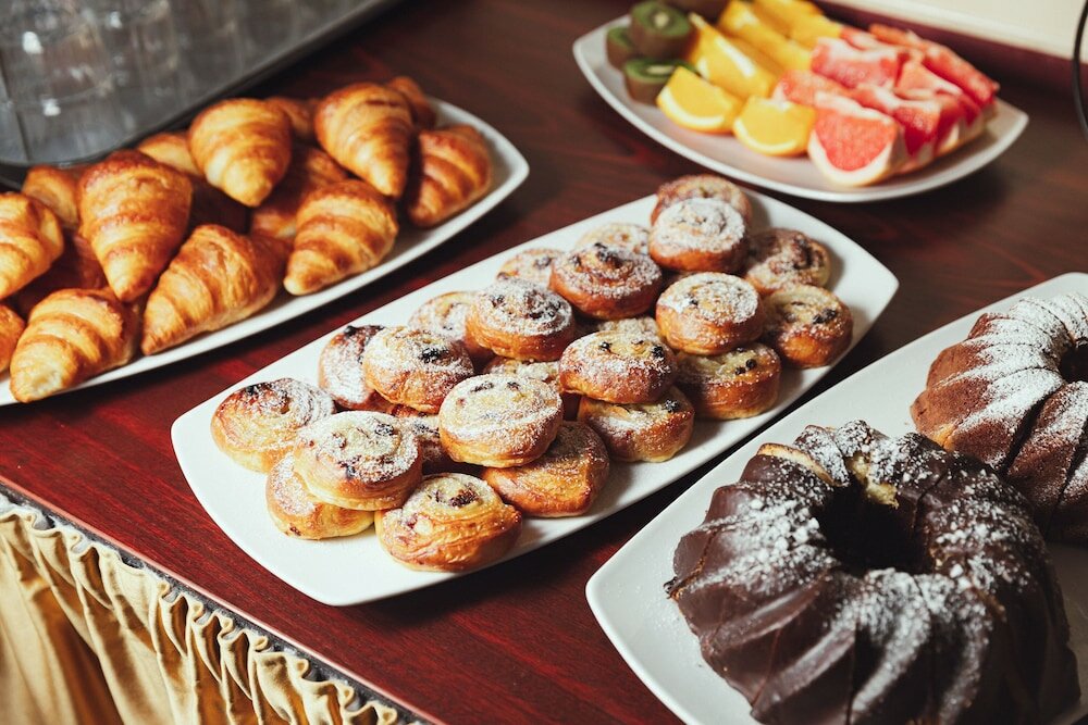 Фото Amigo City Centre Hotel