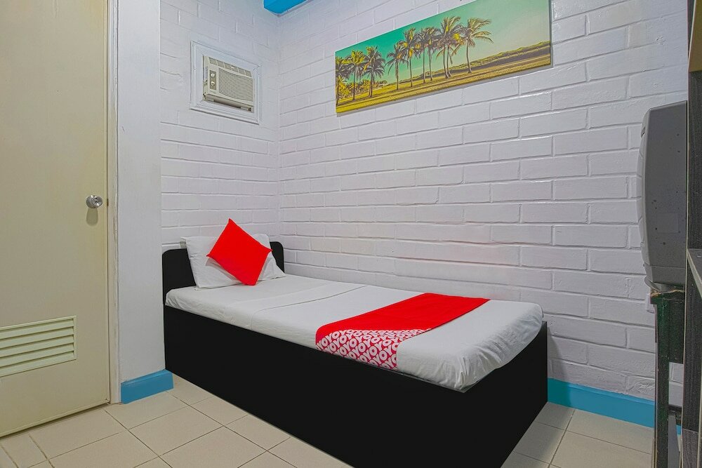 Фото Oyo 749 La Maria Pension And Tourist Inn Hotel