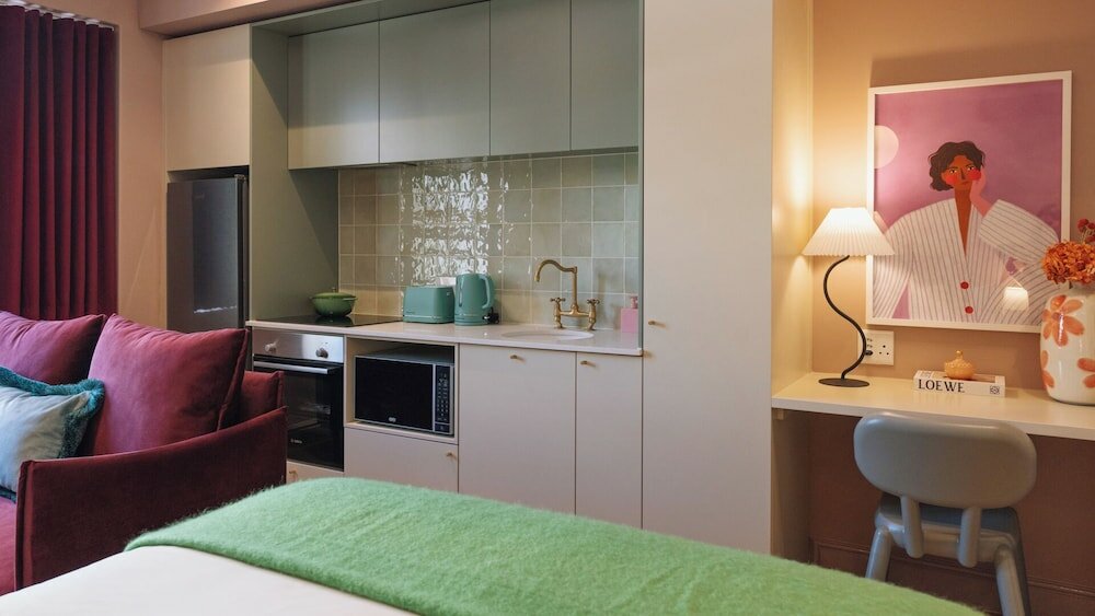 Фото The Trade Boutique Hotel