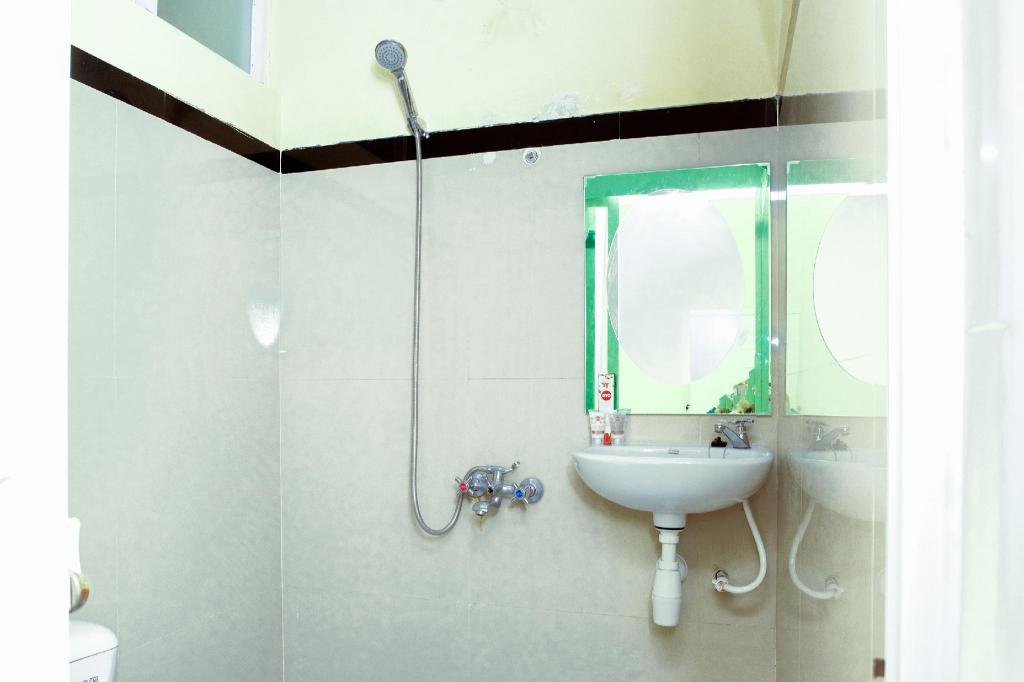 Фото Oyo 314 Emas 23 Guest House Syariah