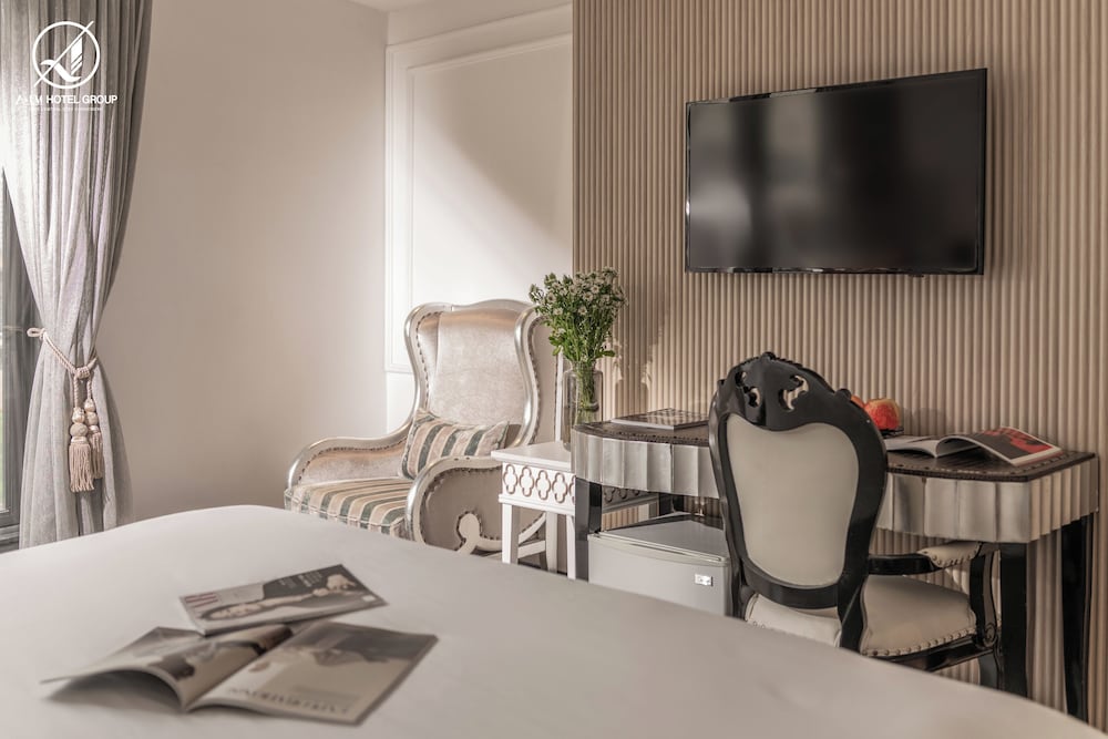 Фото A&em Saigon Hotel