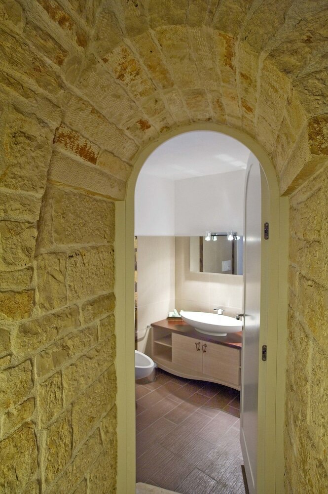 Фото Le Alcove Luxury Resort nei Trulli
