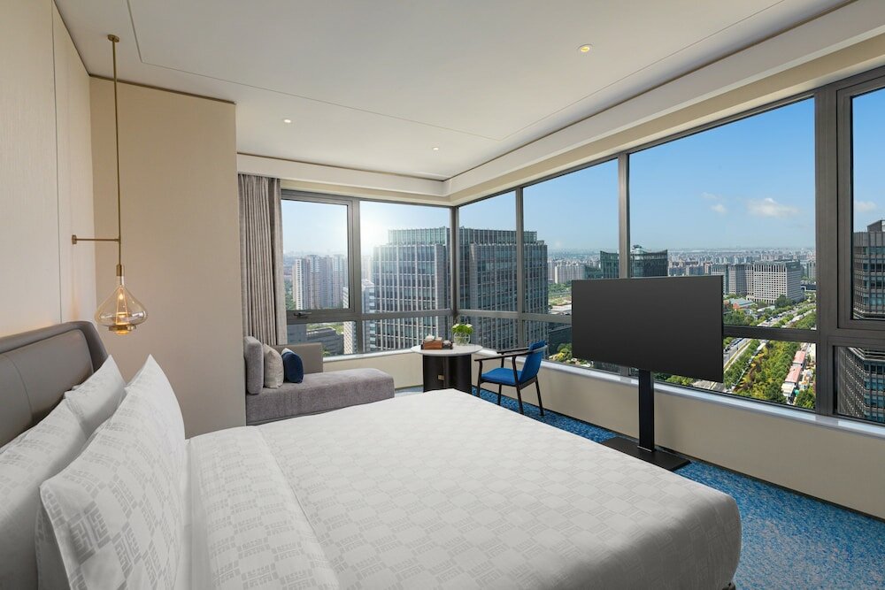 Фото HUALUXE Shanghai Changfeng Park by IHG