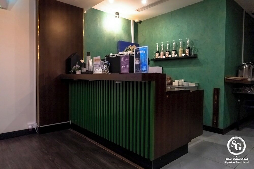 Фото Signature Guest Hotel