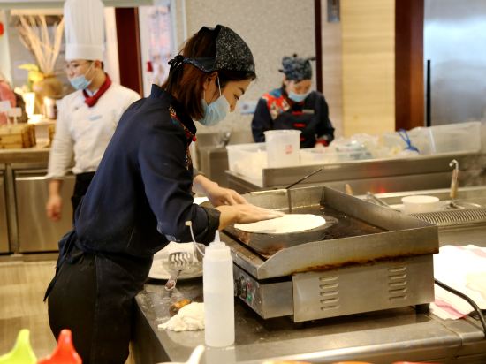 Фото Yiwu ShangCheng Hotel