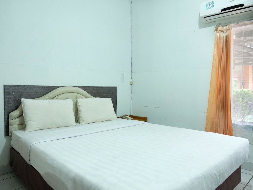 Фото Oyo 358 Hotel Martani